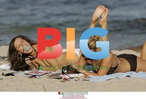 Singer Beulah Relaxes on Beach in Sardinia