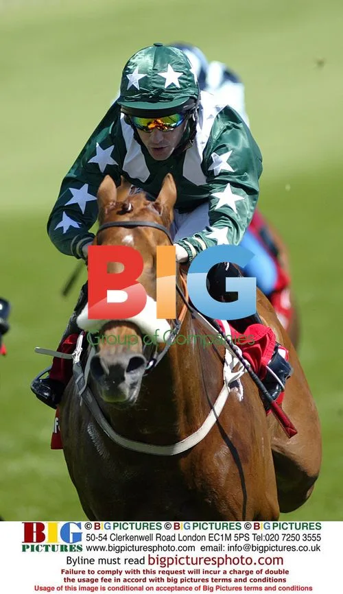 Jockey N Callan winning The Vodaphone Woodcote Stakes
