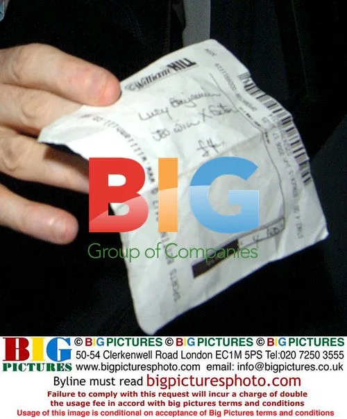 X Factor: Louis Walsh with betting slip