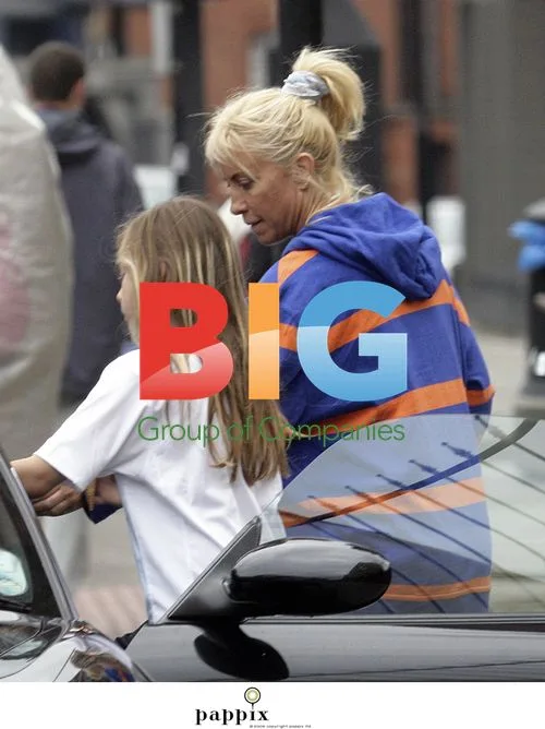 Meg Matthews out of glam look picking up daughter