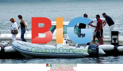 George Clooney boating on Lake Como