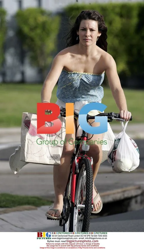 Evangeline Lilly Rides Bike in Hawaii