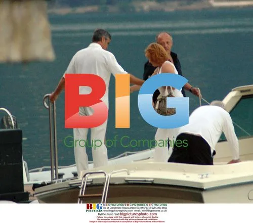 George Clooney Returns to Dock in Lake Como