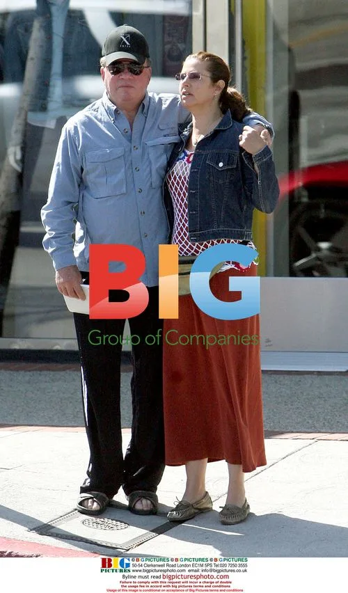 William Shatner and wife stroll on Sunset Blvd