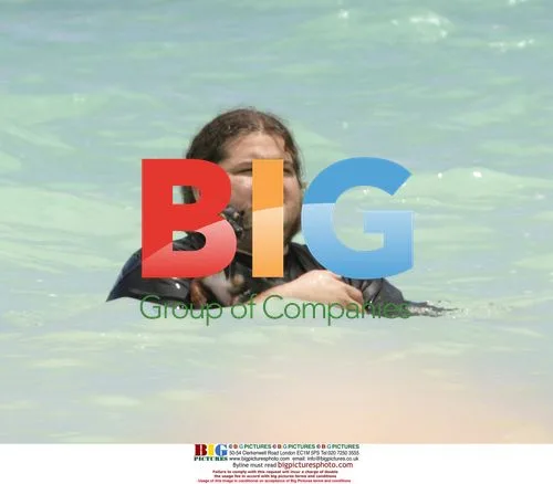 Lost star Jorge Garcia enjoys beach day with girlfriend & dog
