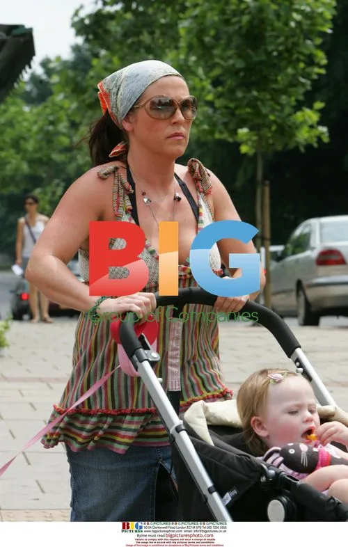Jessie Wallace takes daughter and dog on stroll