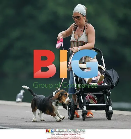 Actress Jessie Wallace out with daughter and dog