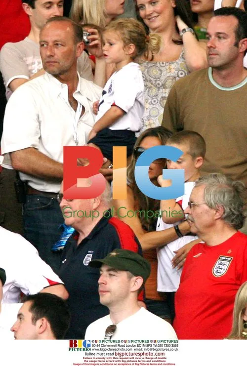 Victoria Beckham and sons watch England v Ecuador