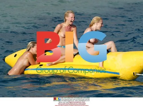 Glamour girls on inflatable banana