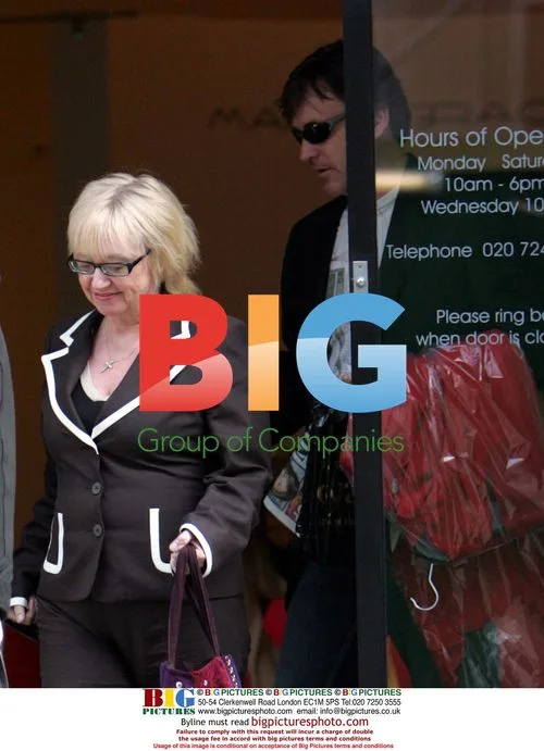Richard Madeley and Judy Finnegan shopping in London