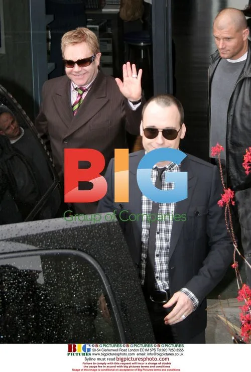 Sir Elton John Kisses Dog in West Hollywood