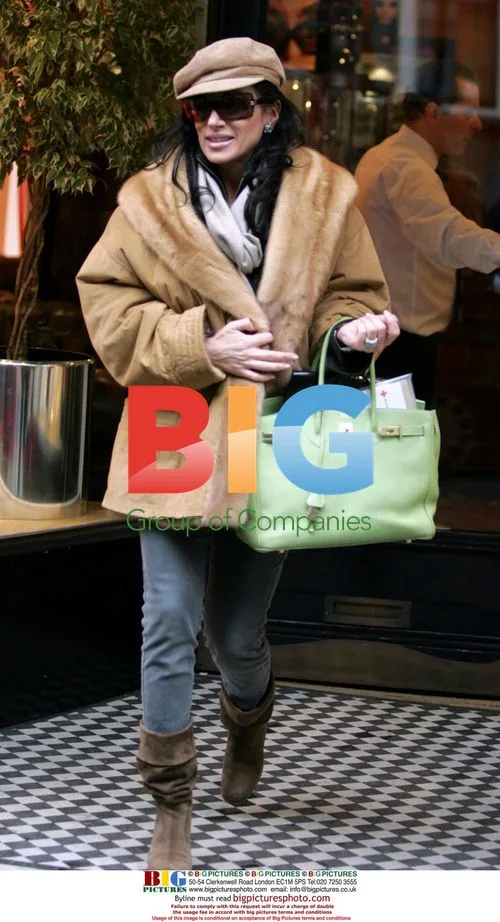 Nancy Del'Olio Steps Out in London