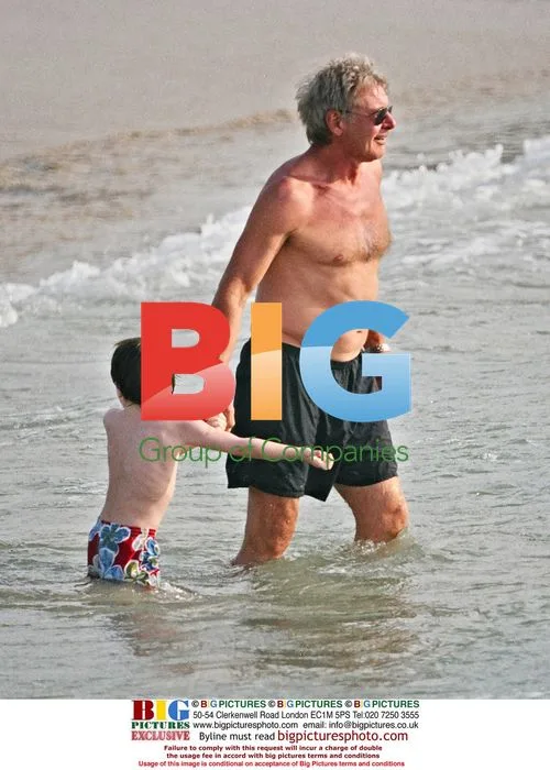 Harrison Ford and Calista Flockhart with son Liam in Hawaii