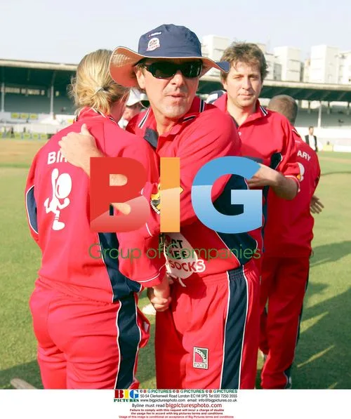 Phil Tufnell hugs Rosalie Birch at Sport Relief cricket match