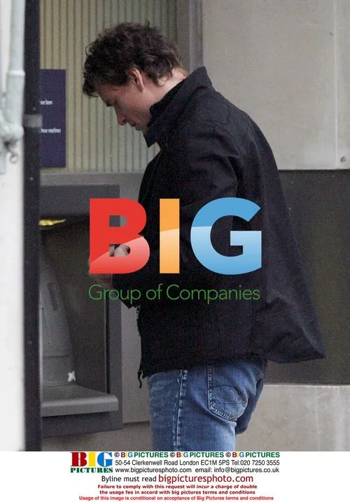 Arsenal goalkeeper Jens Lehmann at cash machine