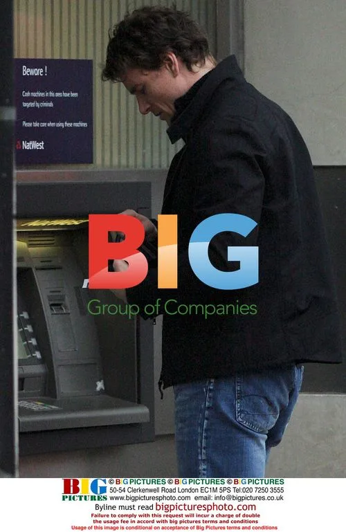 Arsenal's Jens Lehmann at cash machine