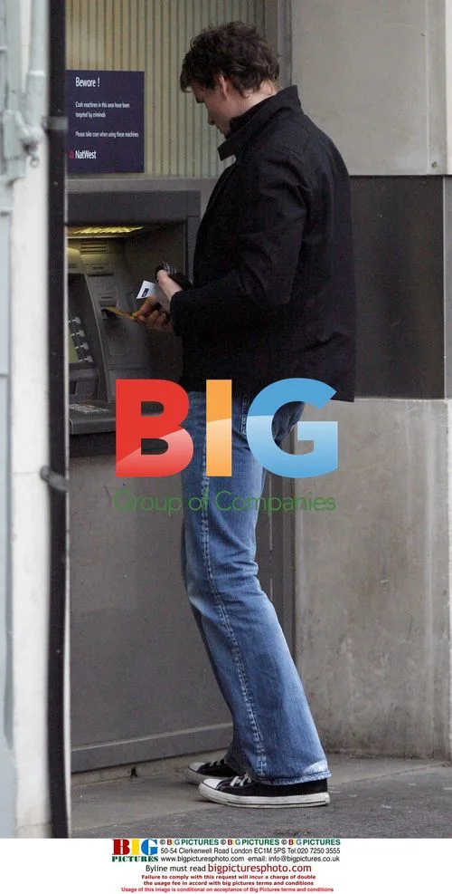 Arsenal's Jens Lehmann at cash machine