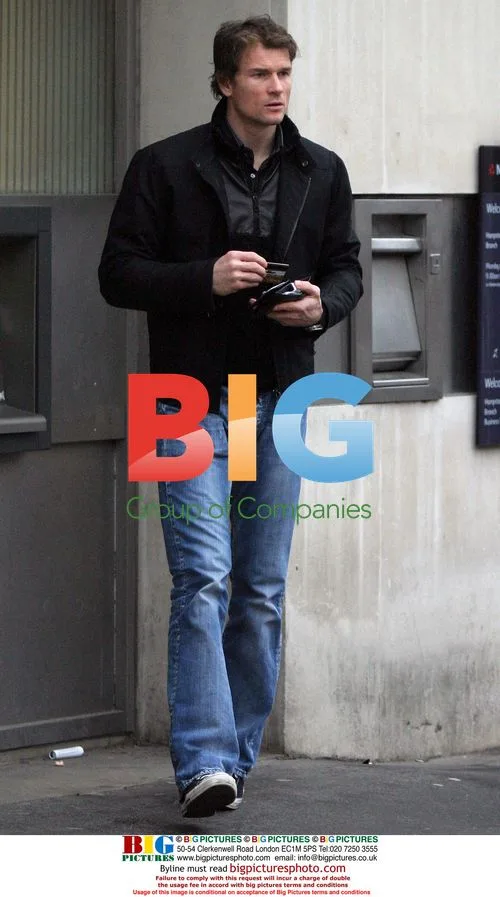 Arsenal's Jens Lehmann at cash machine