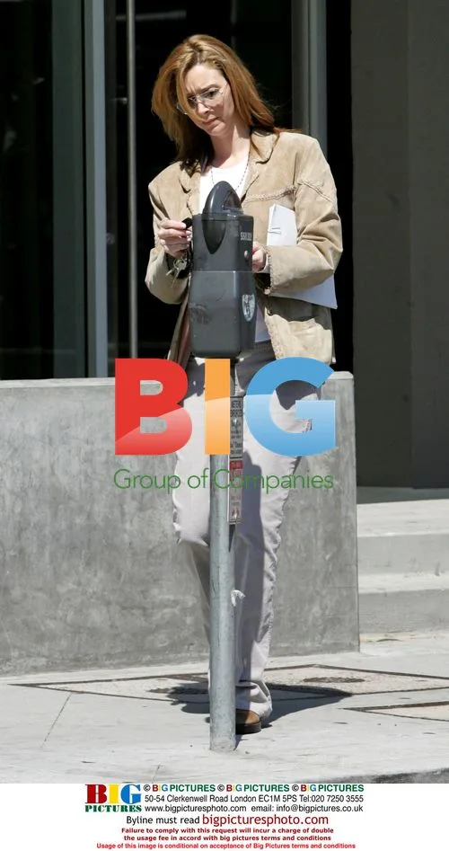 Lisa Kudrow Feeding Parking Meter