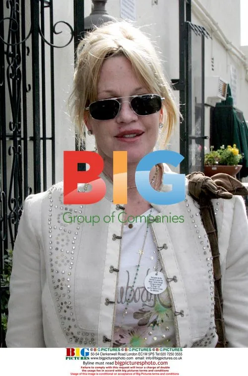 Melanie Griffith Proudly Displays AA Sobriety Badge