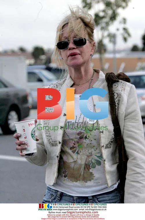 Melanie Griffith Proudly Displays AA Badge