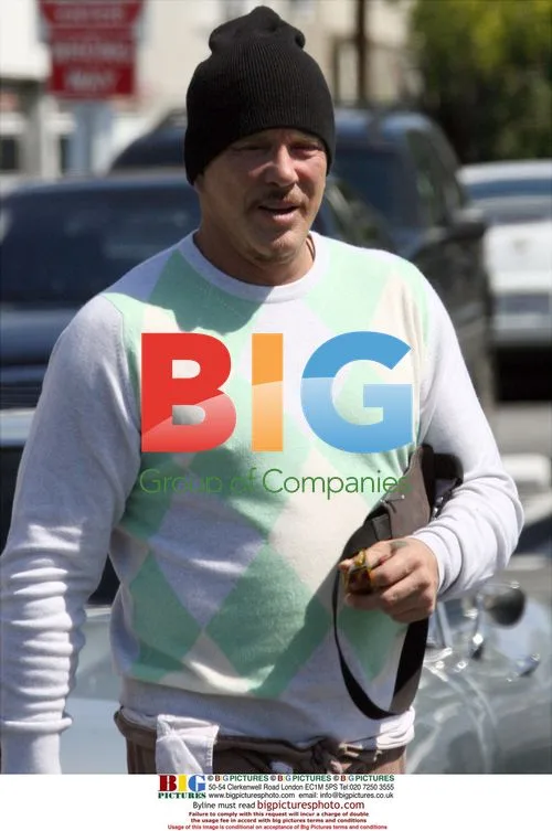 Mickey Rourke Shops for Race Cars