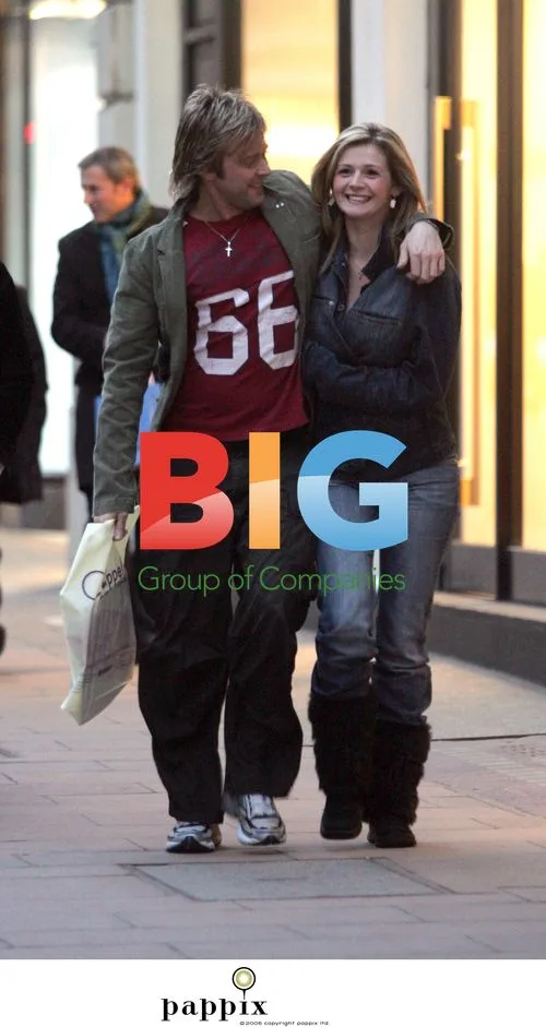 Love rat Darren Day looks bored with girlfriend