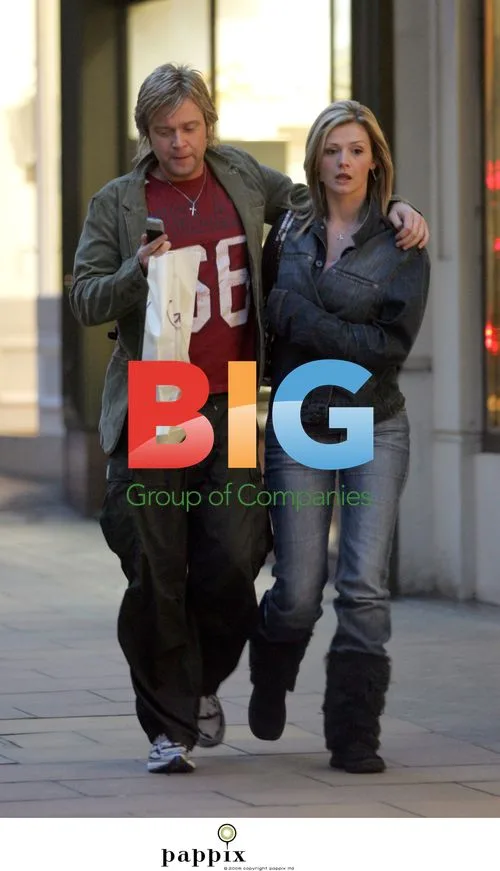 Troubled Darren Day looks bored with girlfriend