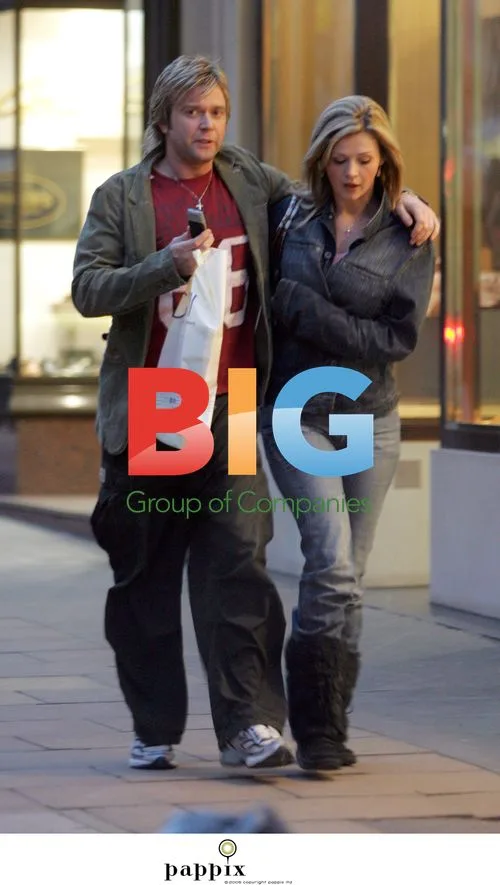 Darren Day looking bored on outing with girlfriend