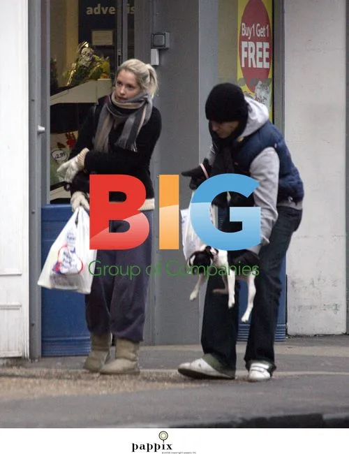Jeremy Edwards waits with dog while girlfriend shops