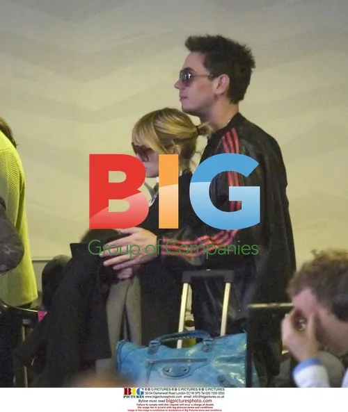 Nicole Ritchie and Adam 'DJ AM' Goldstein at LAX