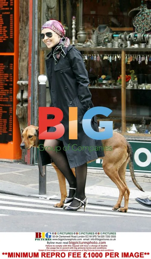 Kylie Minogue walks dog in Paris