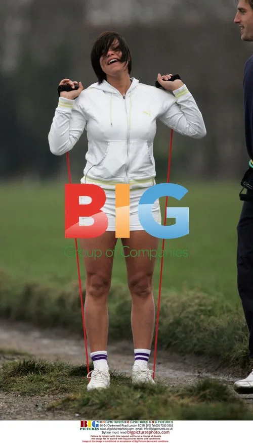 Jade Goody Jogs with Trainer