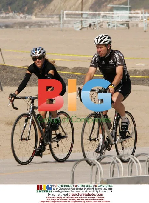 Sheryl Crowe Rides Bicycle with Mystery Man in Santa Monica