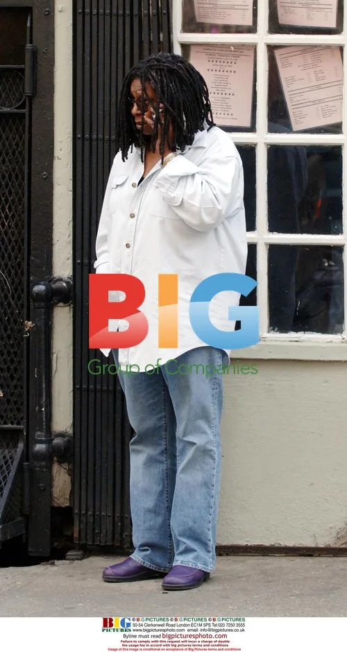 Whoopi Goldberg chats and poses in West Village