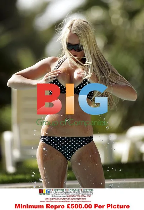 Jennifer Ellison strips off in Spain
