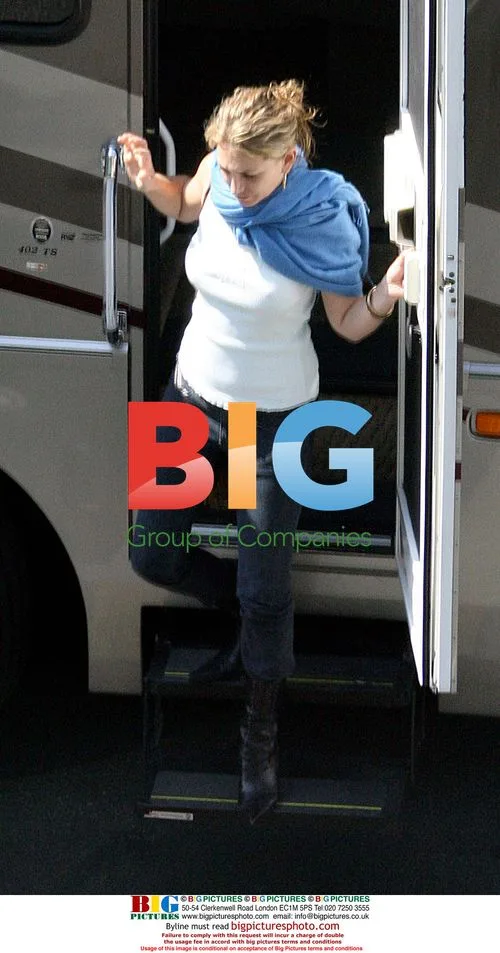Nick Lachey on set with female companion