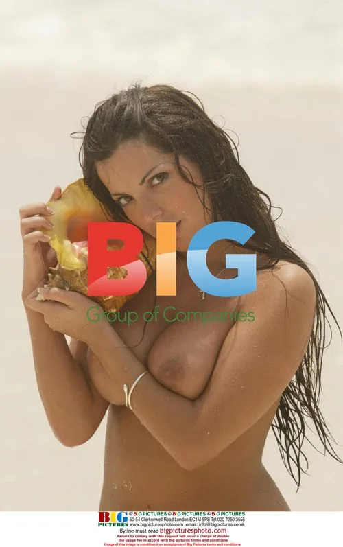 Glamour girl Coralie on Caribbean beach
