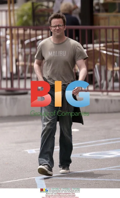 Matthew Perry leaving a meeting