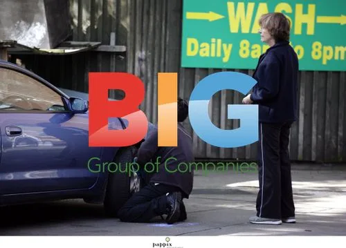 Joan Bakewell grabs newspaper, leaves garage