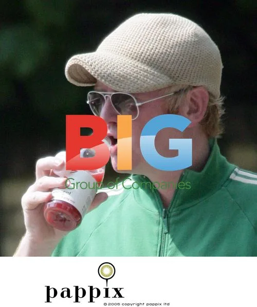 Media Mogul Chris Evans Drinks Fruit Drink in London