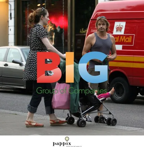 Peter O'Brien with wife and daughter in London