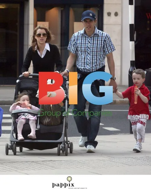 Footballer Phil Neville with family on shopping trip