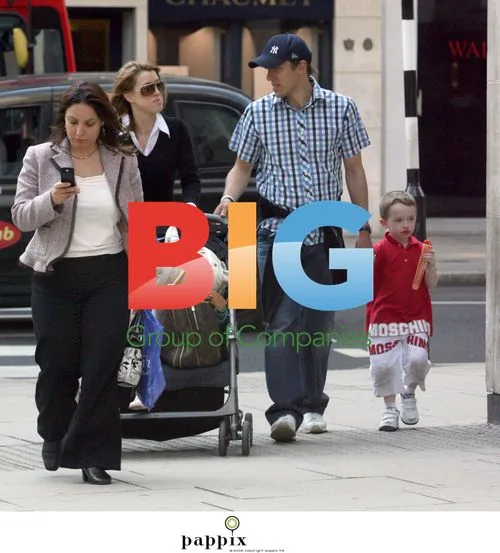 Phil Neville and family on shopping trip