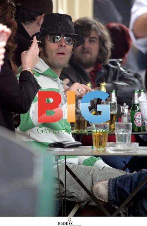 Liam Gallagher and brother Paul at London pub