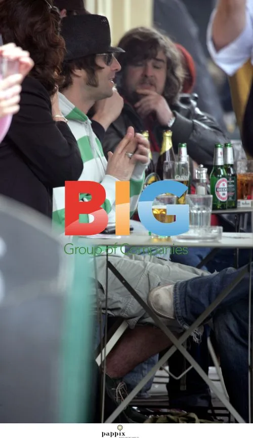 Liam and Paul Gallagher in London Pub