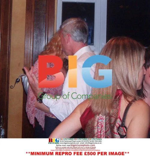 West Ham United boss Alan Pardew with mystery woman