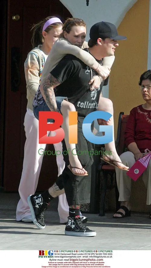 Joel Madden Gives Hilary Duff a Piggyback Ride
