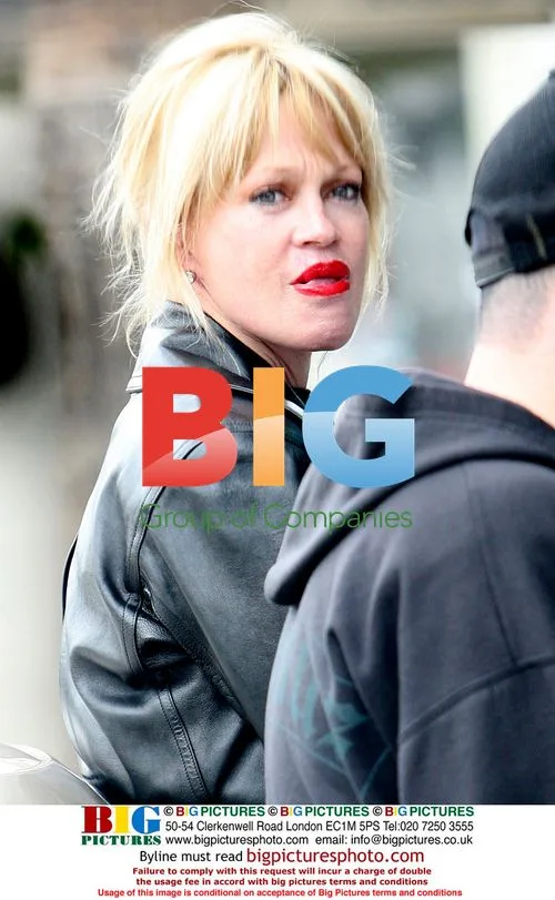 Melanie Griffith Leaving Meeting