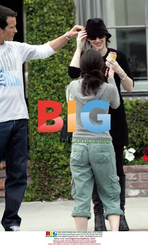 Winona Ryder and China Chow shop with mystery man